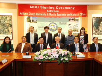 A group photo was taken at the 1st Conference Room, Lantan campus, NCYU, after representatives from both sides signed an MOU.